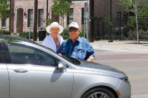 Edna Ray and Arbuckle Sweezy pose with their new Lincoln MK-something