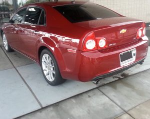 This 2008 Malibu, shown parked outside Silas Fudge Chevrolet was the last recalled vehicle to be repaired by GM.