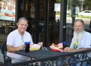 Martin Winterkorn (left) eating fish and chips with Trump's attorney general appointee Jeff Sessions