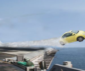 A yellow Beetle TDI is launched off the USS Anthony Weiner