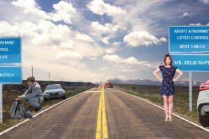 Eelie McFeely stands on her side of the roadway while Chaz McFeely picks up trash on his side. A restraining order forbids each party to cross the center line.