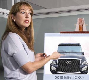 Nissan spokesperson Chiquita Fairbairn unveils the next-gen QX80. The crowd gasped. 