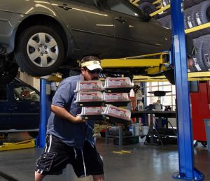 An unidentified Costco tire center customer leaves after receiving his "change"